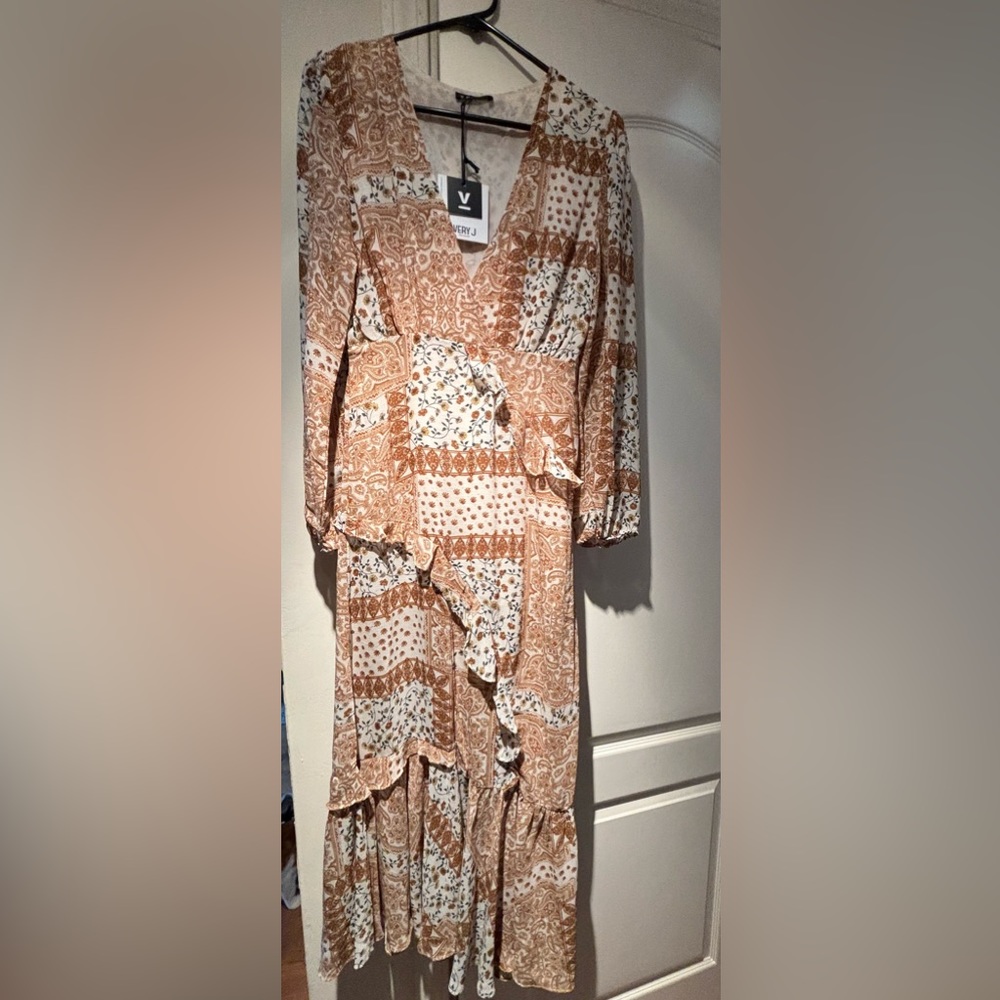 Boho floral dress with ruffle details. So pretty!